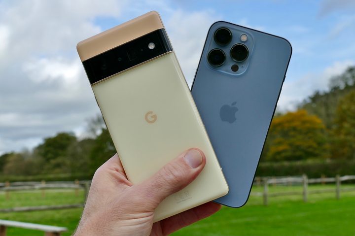 Pixel 6 Pro and iPhone 13 Pro in hand.