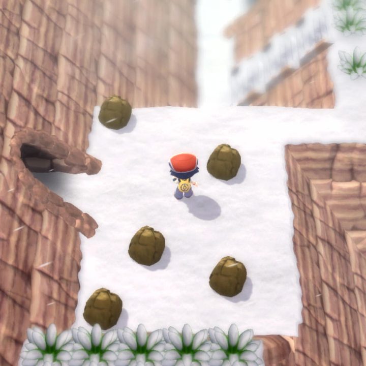 A trainer explores a cave in Pokemon Brilliant Diamond and Shining Pearl.