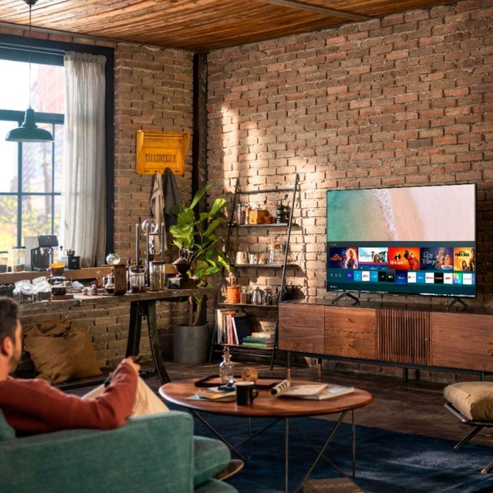A man watches the Samsung 43-inch 4K Class 7 TV.