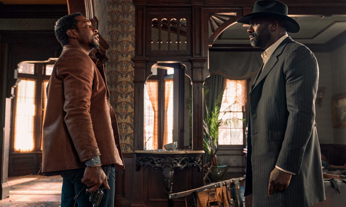 Jonathan Majors and Idris Elba in The Harder They Fall.