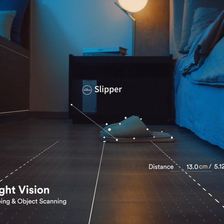 Trifo Lucy Dual-Camera System for Low Light with slippers and bed.