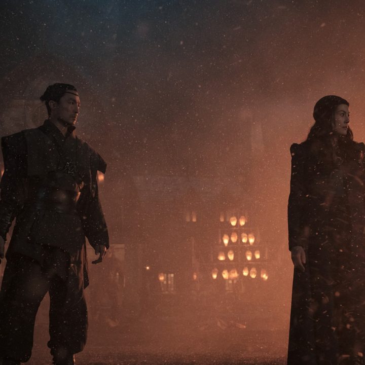 Daniel Henney and Rosamund Pike in a scene from The Wheel of Time series.