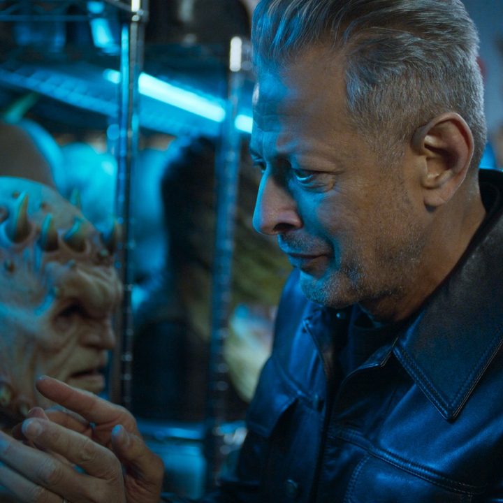 Jeff Goldblum investigates monster masks in a scene from season 2 of The World According to Jeff Goldblum.