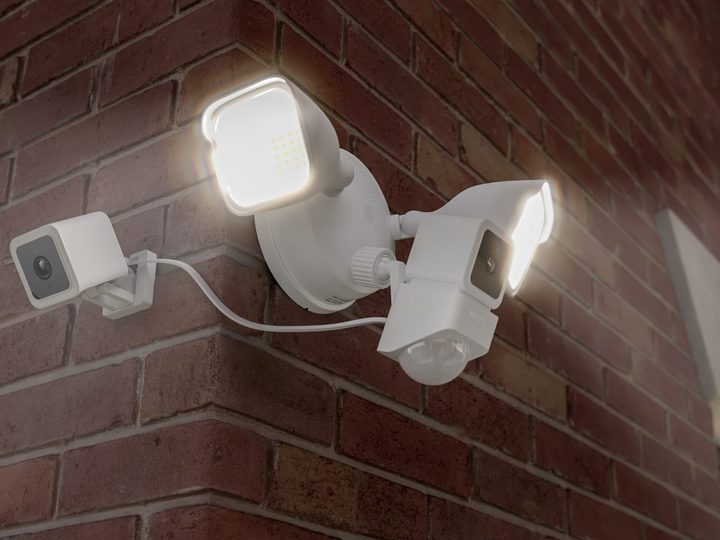 Wyze Cam Floodlight on the corner of a brick house.