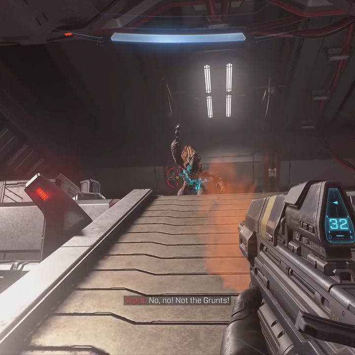 A Halo Infinite grunt quips while standing on a ramp.