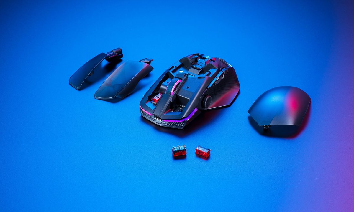 Asus ROG Chakram X mouse on a blue background.
