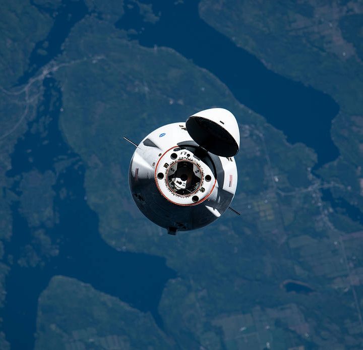 SpaceX's Cargo Dragon approaching the space station.