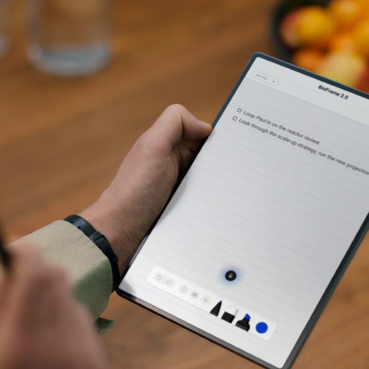 Dell's Concept Stanza, a simple tablet, being held in a hand.