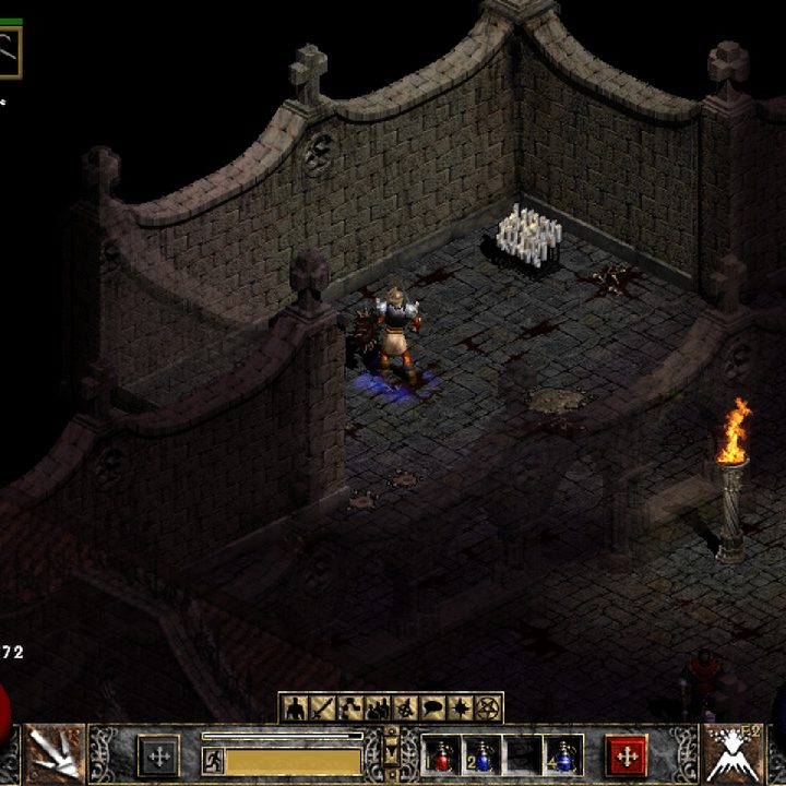 A side room in Diablo II with a handful of candles.