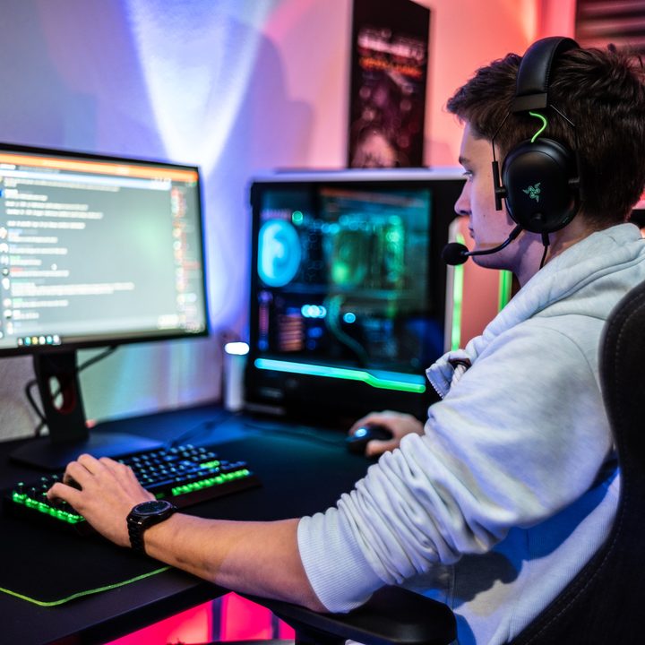 Gamer using Discord on a gaming desktop PC.
