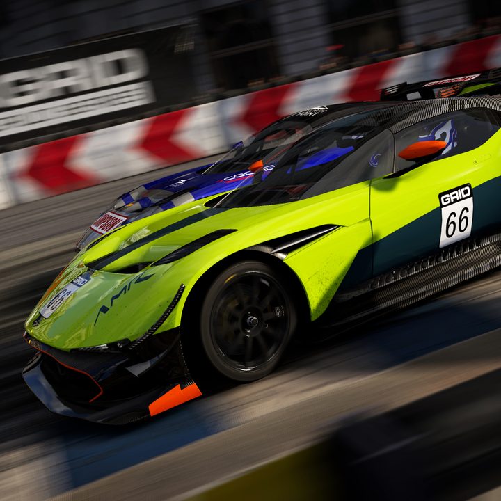 Two cars race alongside one another in Grid Legends.