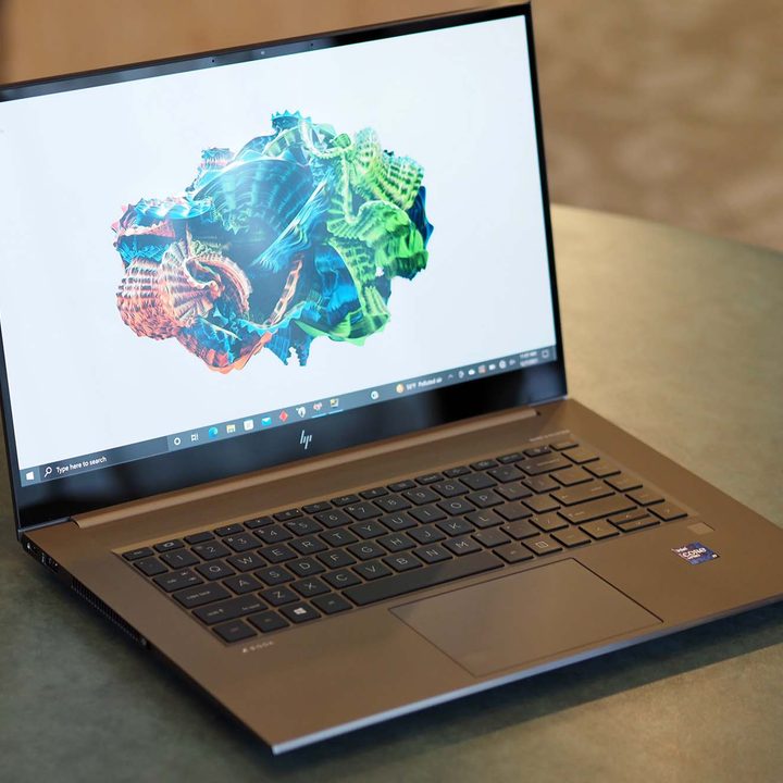 A HP ZBook Studio G8 sits on a table.