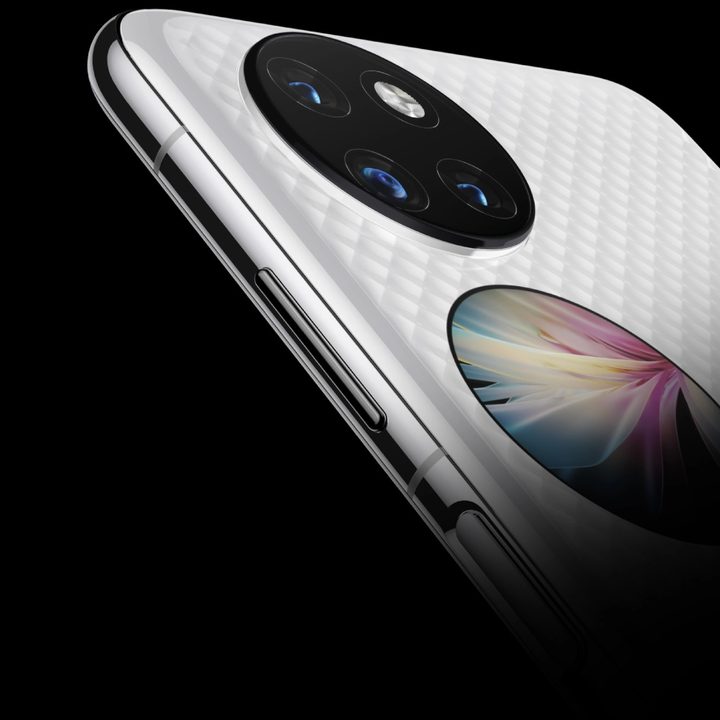 Close up showing an unfolded Huawei P50 Pocket with its cover display and rear camera setup.