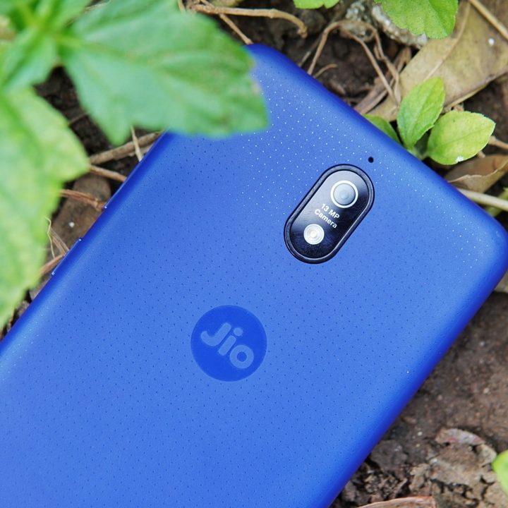 The rear panel of the JioPhone Next showing the camera and a prominent Jio logo.