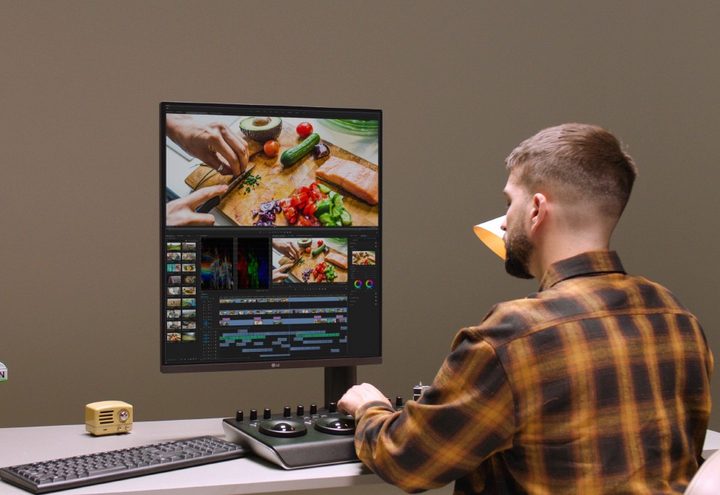 The square-shaped LG DualUp monitor being used on a desk.