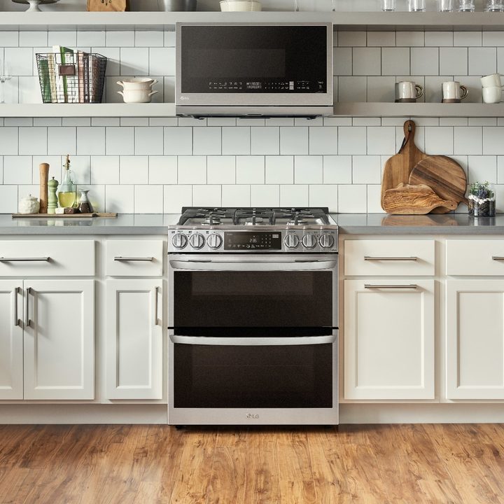 A kitchen featuring the LG InstaView Double Oven Range and Over-the-Range Microwave Oven.