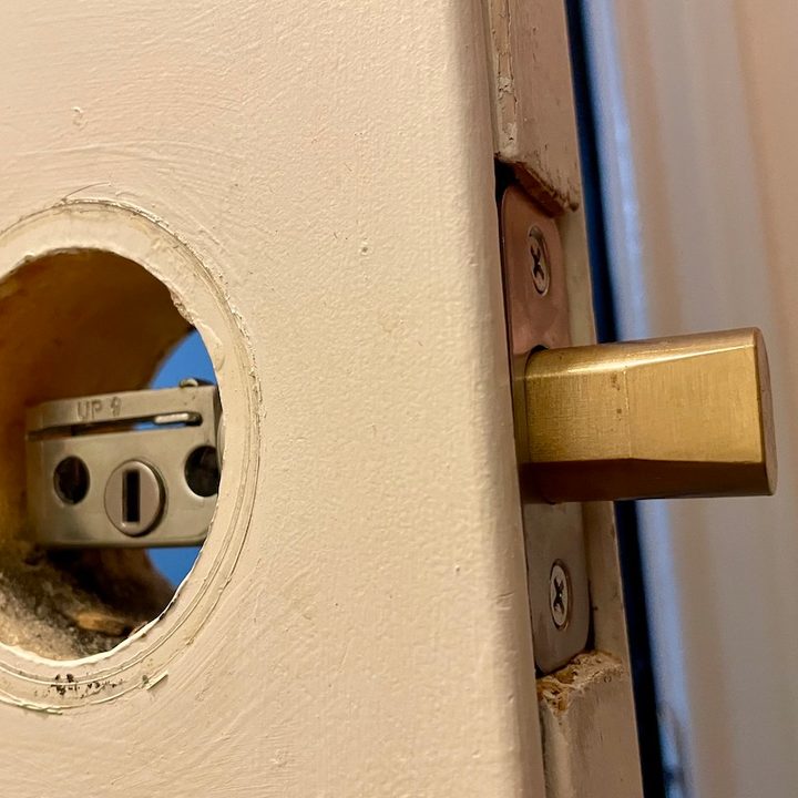Installing the deadbolt for the Lockly Flex Touch.