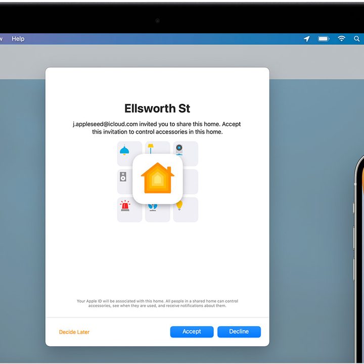 MacBook showing a HomeKit Home sharing invitation.