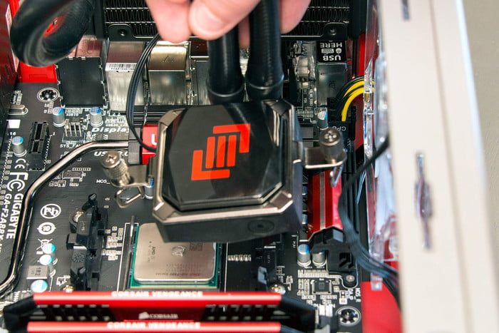Installing an AIO CPU waterblock.