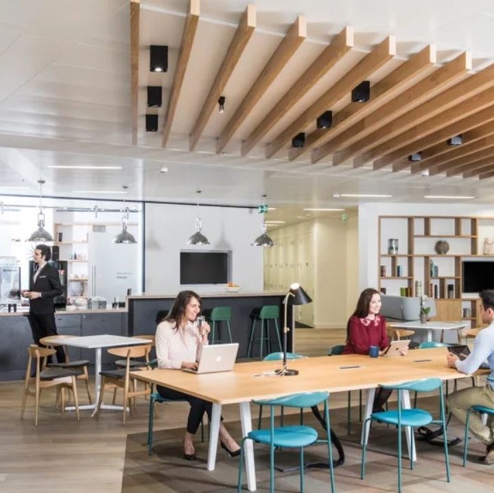 Regus coworking space inhabited with people inside.
