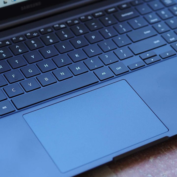 A close-up image of the Samsung Galaxy Book Odyssey's keyboard and trackpad