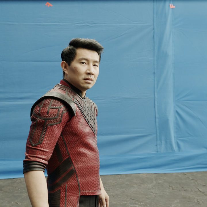 Simu Liu against a blue screen while filming Shang-Chi and the Legend of the Ten Rings.