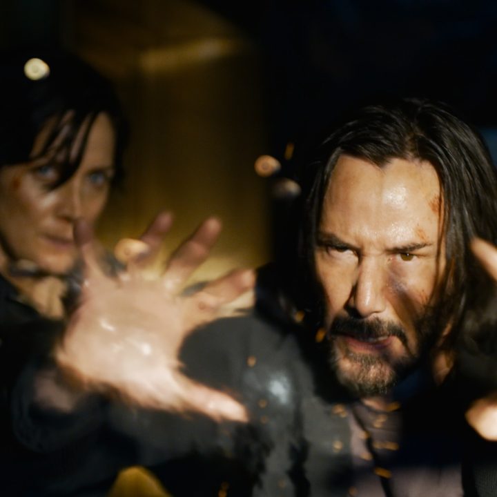 Carrie-anne Moss and Keanu Reeves in a scene from The Matrix Resurrections.