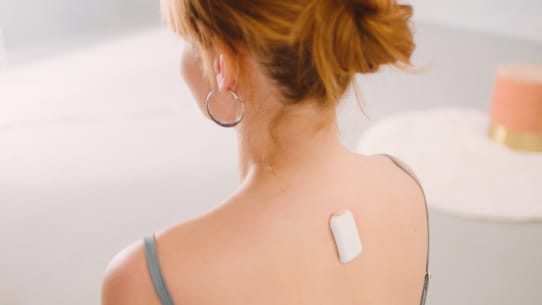 Upright go being worn using adhesive on the back.