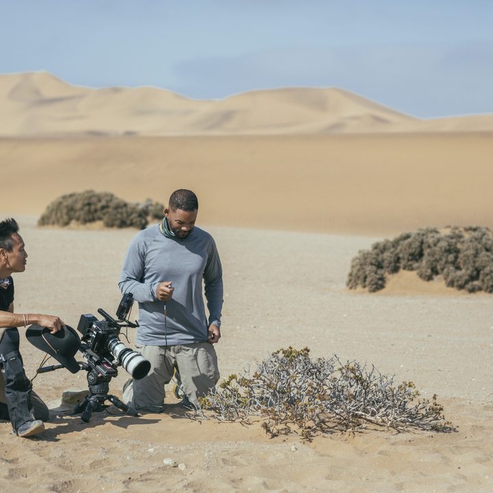 Explorer Albert Lin and Will Smith in the desert in a scene from Welcome To Earth.