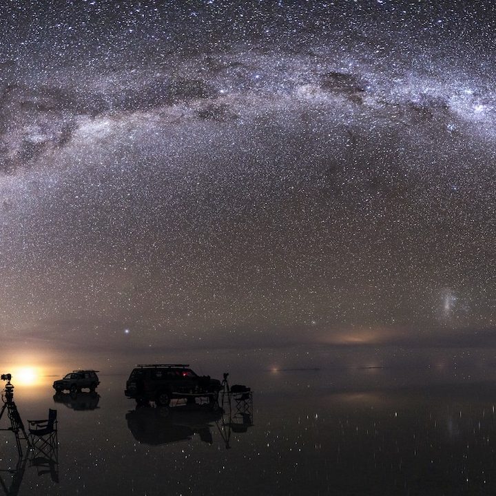 The Mily Way reflected in the flood waters of the salar in a scene from Welcome to Earth.