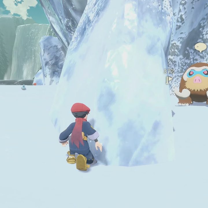 A trainer sneaking up on an alpha Pokémon.