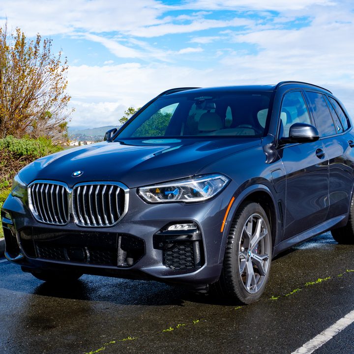 BMW X5 PHEV in a parking lot.
