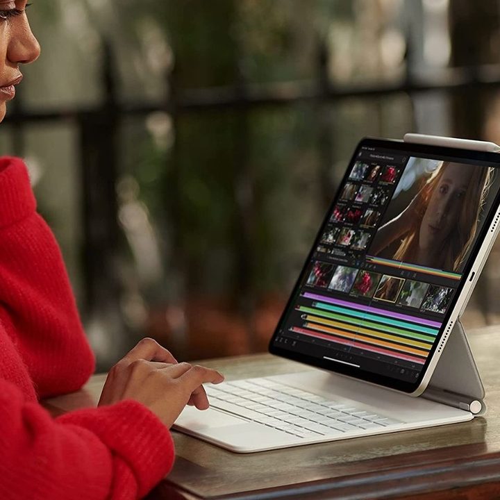 A woman uses a 2021 iPad Pro 11-inch.
