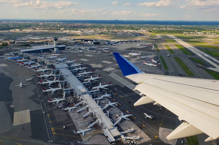 View of John F. Kennedy International Airport from departing aircraft.
