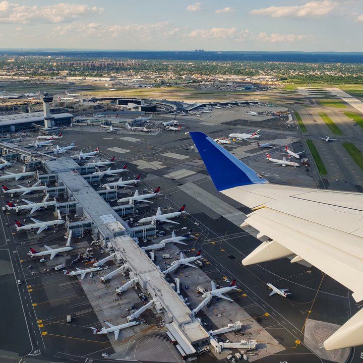 View of John F. Kennedy International Airport from departing aircraft.