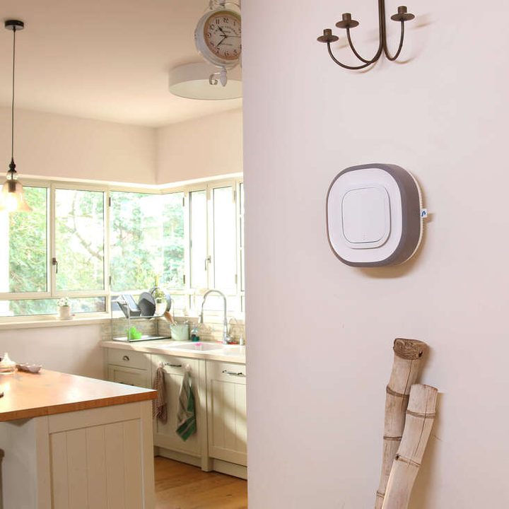 Aura Air Purifier installed on wall by kitchen.