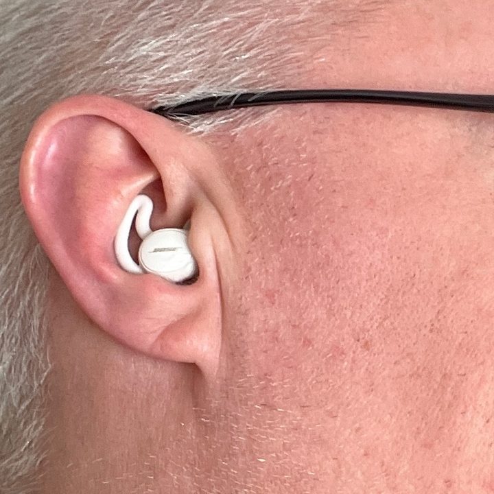 Bose SleepBuds 2 worn in-ear.