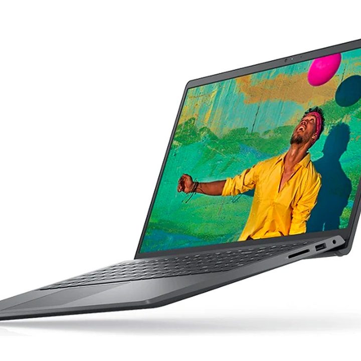 Dell Inspiron 15 3000 Laptop on a white background displaying a colourful scene.