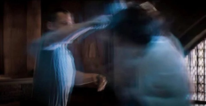 Timothée Chalamet and Josh Brolin fight with shimmering body shields in a scene from Dune.