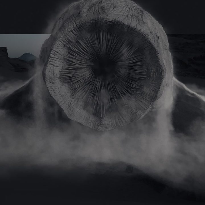 A monstrous sand worm rises from the desert in an early VFX shot from Dune.