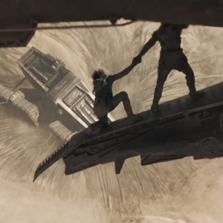 A sandworm consumes a spice mining craft in a scene from Dune.