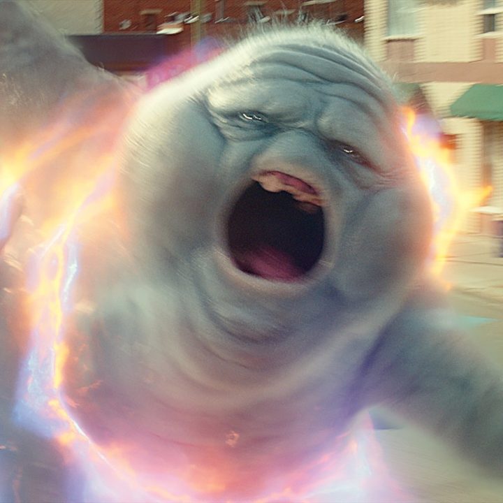 A ghost being chased by the Ecto-1 in Ghostbusters: Afterlife.
