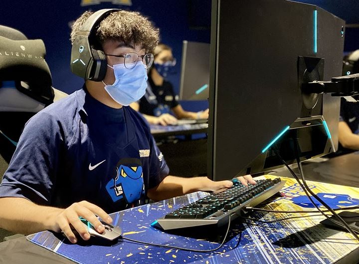 An esports player on St. Mary's esports team plays a game.