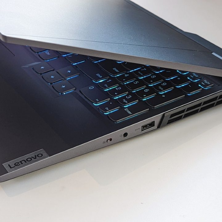 Lenovo Legion 5 Pro with the lid half-closed.