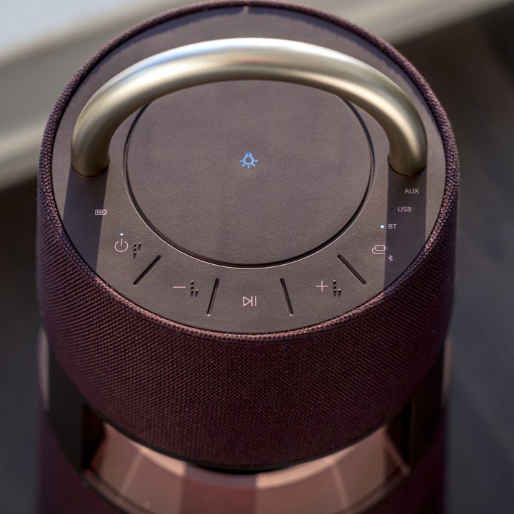 The LG XBoom 360 speaker has a convenient handle.