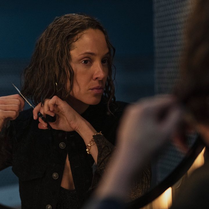 Margarita Levieva cuts her hair in a scene from In From The Cold.
