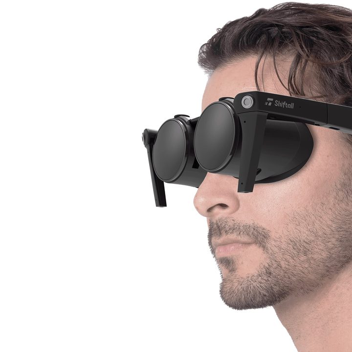 The MeganeX VR headset sits on a human's face.