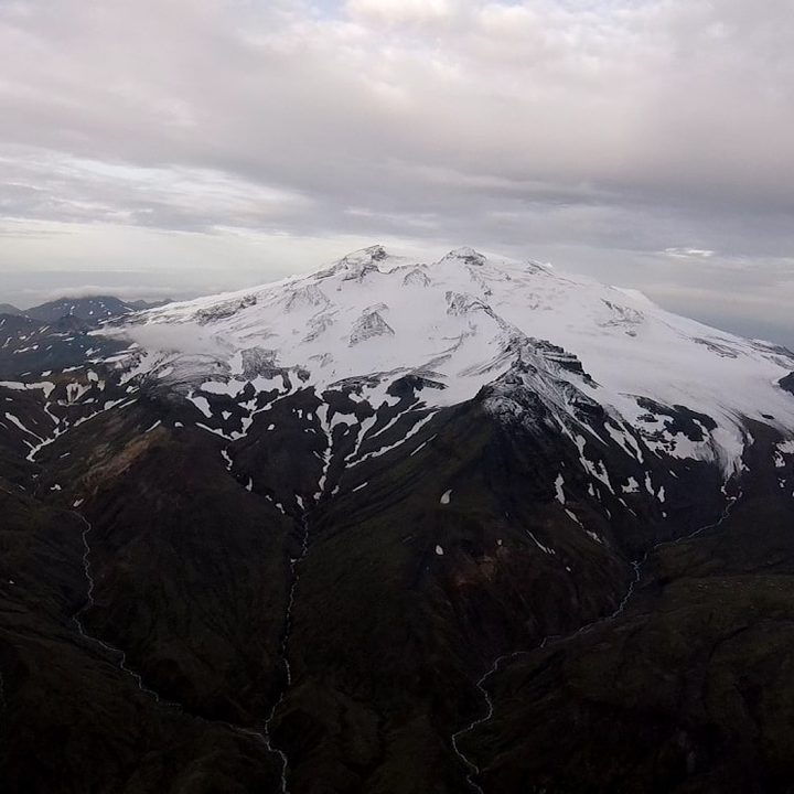 The Makushin Volcano summit captured by a camera on the wing of the S2 aircraft.