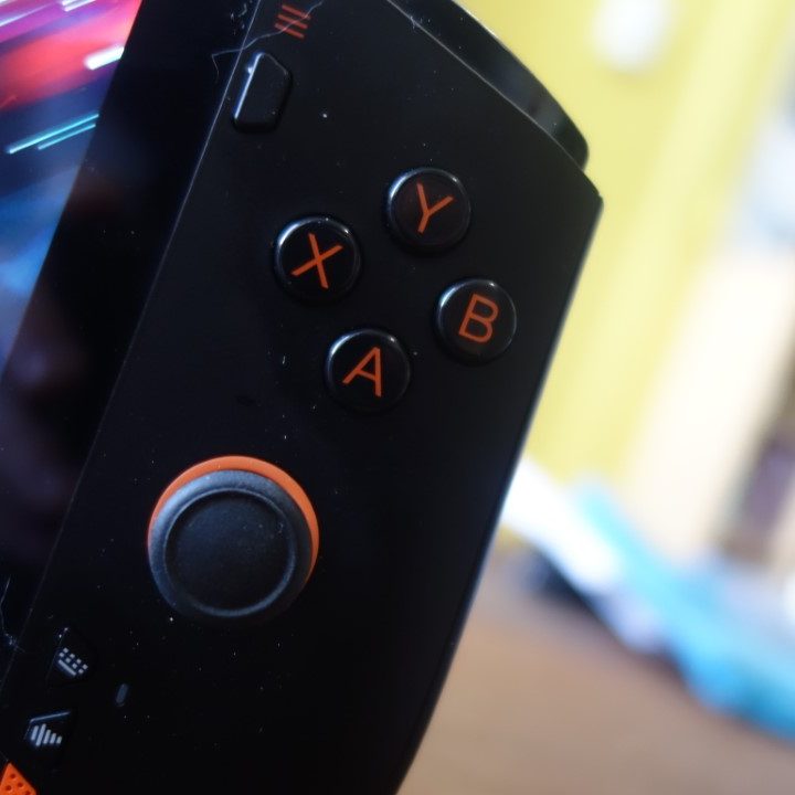 The ABXY buttons and joystick of a Onexplayer Mini.