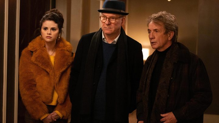 Mabel, Charles, & Oliver look shocked in Hulu's Only Murders in the Building.